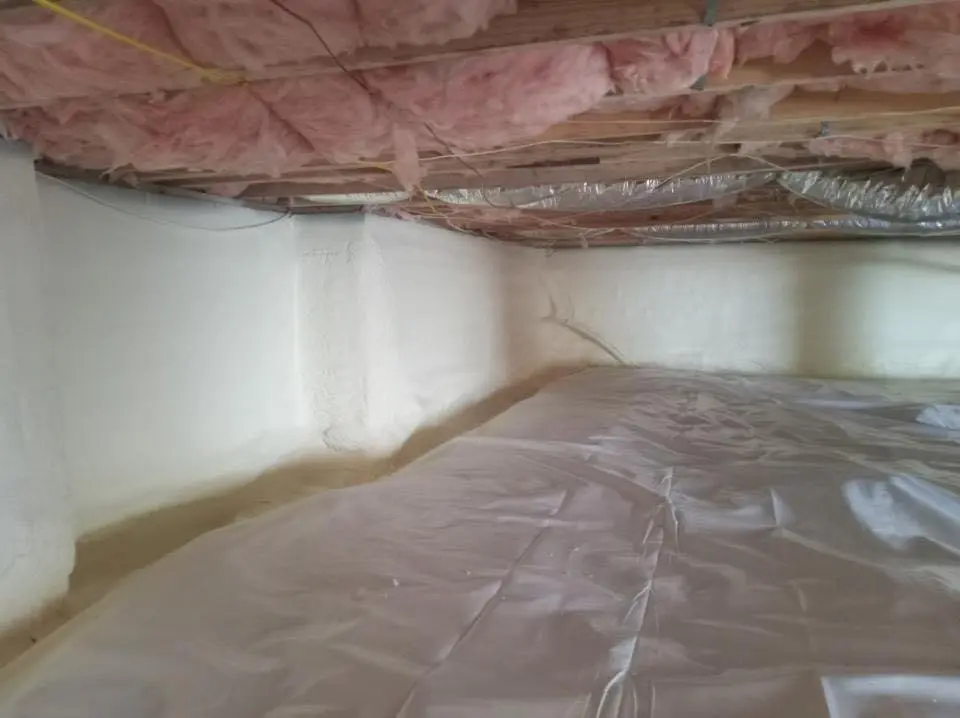 Crawl space encapsulation with closed-cell spray foam for Commercial Roof Restoration in Brevard